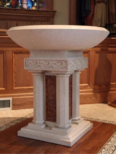 Ornamented Raised Stone Baptismal Font